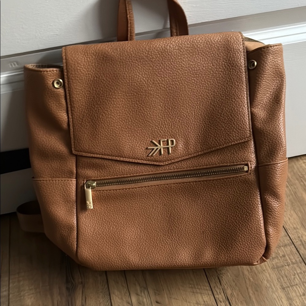 Tan Leather Backpack with Gold Accents
